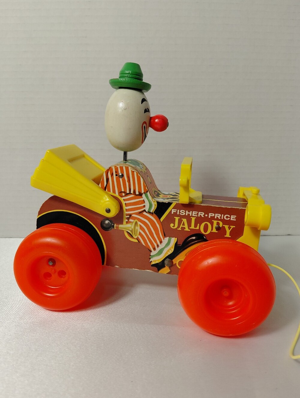 Fisher-Price Orange Wheels Yellow & Red Jalopy Pull Toy with Clown - Vintage